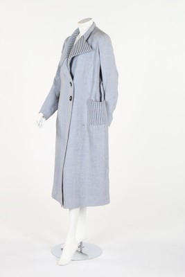 Lot 112 - A Worth couture pale blue wool/linen summer...