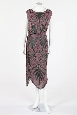 Lot 113 - A beaded chiffon tunic, early 1920s,...