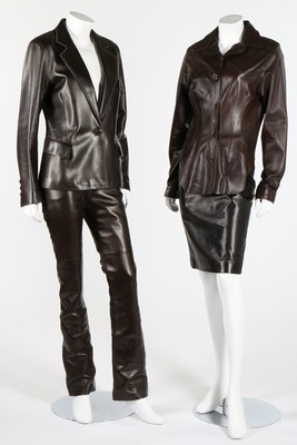 Lot 130 - A Jitrois black leather belted jacket with fox...
