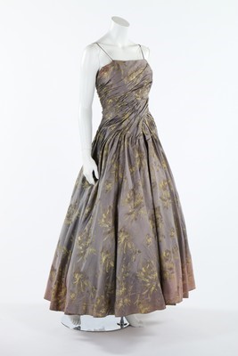 Lot 159 - A Dior London grey and yellow brocaded satin...