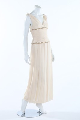 Lot 164 - A Chanel ivory chiffon evening gown, circa...