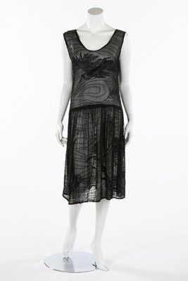 Lot 167 - A black beaded chiffon flapper dress, circa...