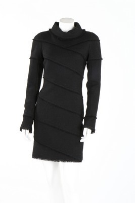 Lot 172 - A Chanel black wool dress with diagonal...