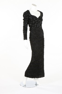 Lot 173 - An Odicini beaded black lace evening gown,...