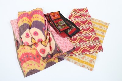 Lot 455 - Central Asian robes and textiles, comprising:...