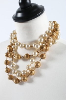 Lot 213 - A Chanel multi-strand pearl and gilt beaded...