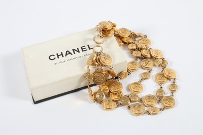 Lot 215 - A Chanel multi-strand gilt disc necklace,...