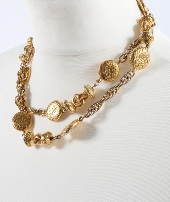 Lot 218 - A Chanel gilt chain and black leather belt,...