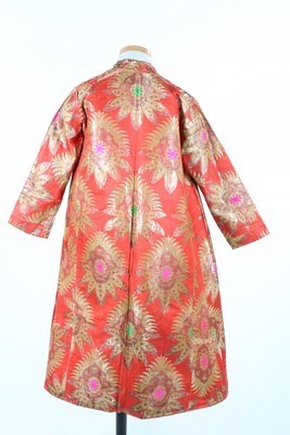 Lot 463 - A chapan of orange Russian brocade, Uzbekistan,...