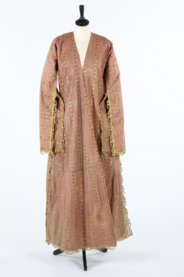 Lot 464 - A striped peach silk brocade anteri robe,...