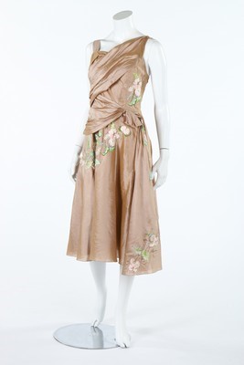 Lot 372 - A Dior boutique embroidered golden silk...