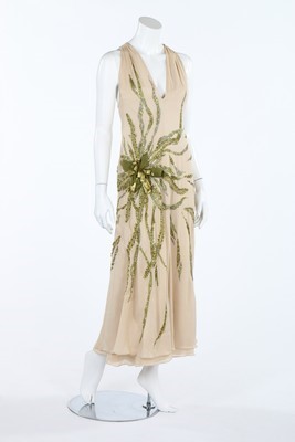 Lot 374 - A Valentino boutique ivory crepe evening gown...