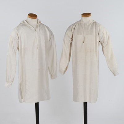 Lot 410 - Two men's shirts, late 18th-early 19th century,...