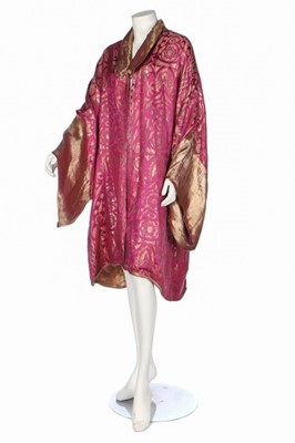 Lot 335 - A pink and gold lamé evening jacket, 1920s, of...