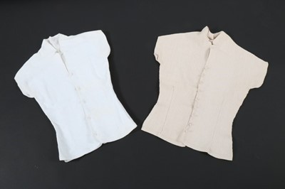 Lot 430 - Two crochet bodices in white and ecru, 1950s,...