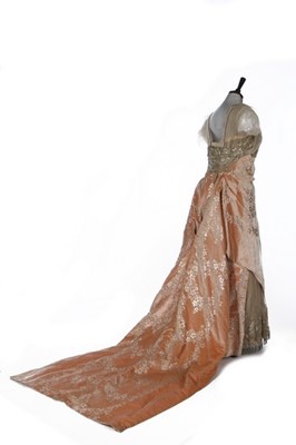 Lot 317 - A Maison Worth pale peach and gold voided...