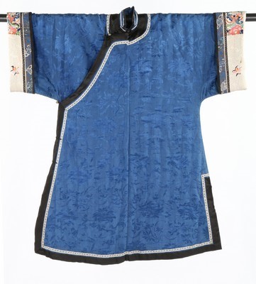 Lot 482 - A woman's blue damask silk winter robe,...