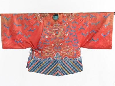 Lot 488 - An embroidered orange satin dragon robe,...