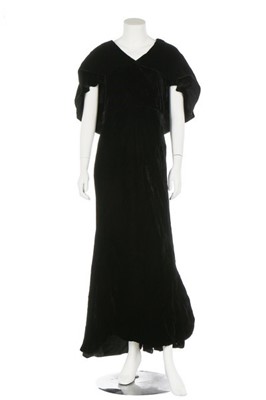 Lot 31 - A couture black velvet evening gown, 1930s,...