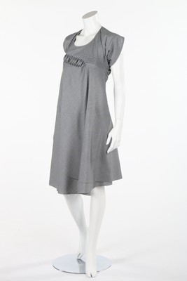 Lot 319 - A Junya Watanabe pin-striped grey wool dress...