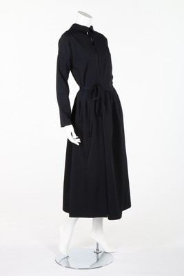 Lot 322 - A Comme des Garcons navy gabardine dress with...