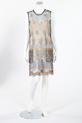 Lot 325 - A Comme des Garçons embroidered tulle dress,...