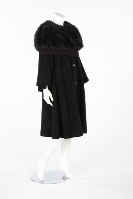 Lot 326 - A Comme des Garçons black wool coat with...