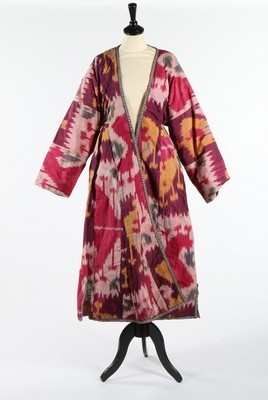 Lot 466 - A woman's ikat silk padded chapan, first half...