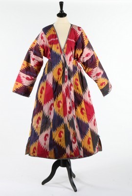 Lot 472 - A woman's padded ikat silk chapan, Uzbek,...