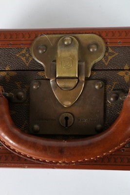 Lot 262 - A Louis Vuitton small, monogrammed hard-sided...