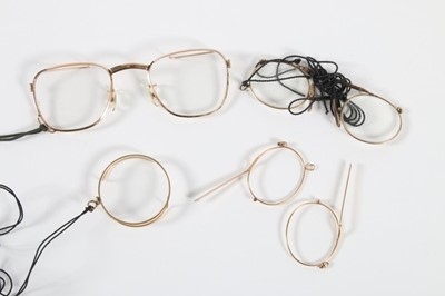 Lot 293 - A group of eyeglasses and spectacles,...