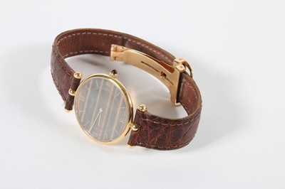 Lot 297 - A Van Cleef & Arpels man's gold wrist watch,...