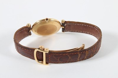 Lot 297 - A Van Cleef & Arpels man's gold wrist watch,...