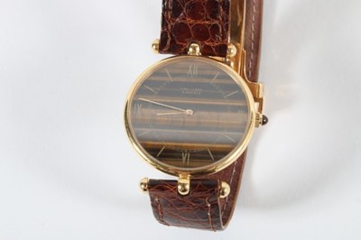 Lot 297 - A Van Cleef & Arpels man's gold wrist watch,...