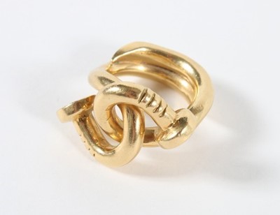 Lot 307 - A Cartier-style gold bent nail bracelet and...