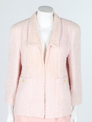 Lot 13 - A group of pink Chanel boutique clothing,...