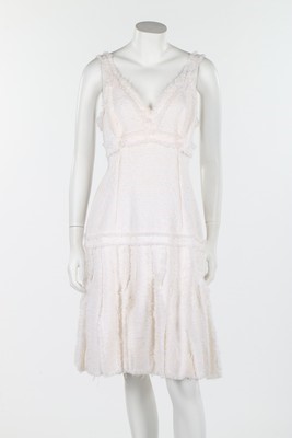 Lot 24 - A Chanel white tweed summer dress, 2004,...