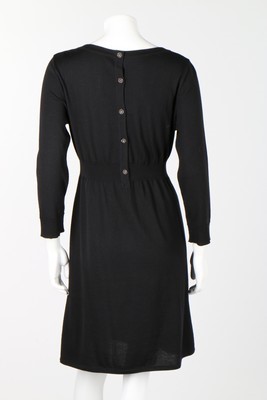 Lot 34 - Three Chanel black knitted dresses, circa