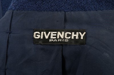 Lot 111 - A Givenchy couture blue bouclé wool suit,...