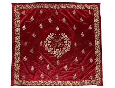 Lot 443 - An embroidered red satin wedding coverlet,...