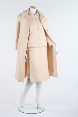 Lot 122 - A Courrges ivory wool suit and coat, circa...