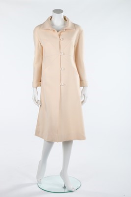 Lot 122 - A Courrges ivory wool suit and coat, circa...