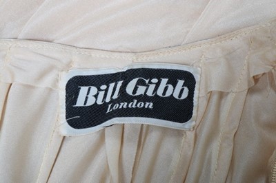 Lot 144 - A Bill Gibb cream Quiana jersey evening dress,...