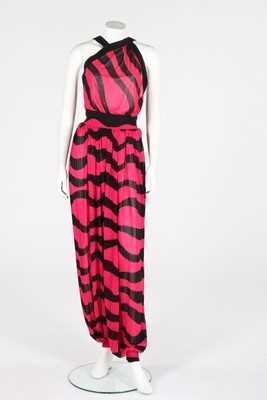 Lot 153 - An Yves Saint Laurent fuchsia pink and black...