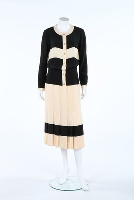 Lot 184 - A Chanel black and ivory crpe de chine dress,...