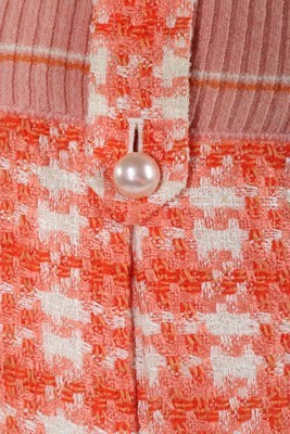 Lot 28 - A Chanel orange and white tweed ensemble, 2001,...