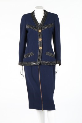 Lot 37 - A Chanel couture navy wool suit, 1992,...