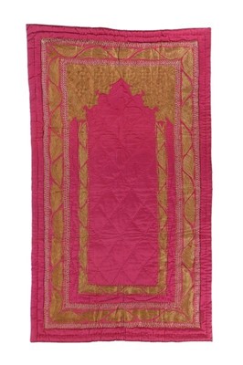 Lot 450 - Two pink silk prayer arches or qibleh cloths,...