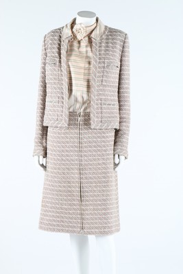 Lot 15 - A Chanel tweed suit, 2003, labelled and size...