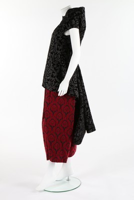 Lot 234 - A Comme des Garons black and red flocked and...